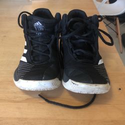 Adidas size for black and white basketball shoes for boys or girls in great condition