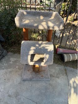 Carpeted wood Cat tree