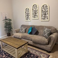 Sofa, Coffee Table And Decorative Rug