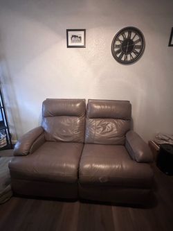 Brown Leather Reclining Sofa & Loveseat Set