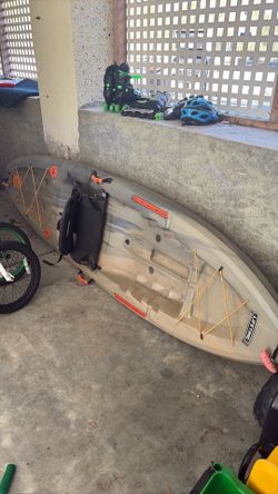 Lifetime 10 foot kayak with paddle, life vest, walking cart