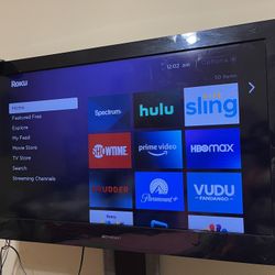 Emerson 40” Tv With Free Roku Streaming And free Tv Stand
