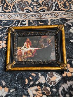 Black and gold ornate frame with Lady of Shalott picture