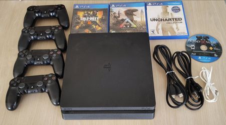 PLAYSTATION 4 SLIM 500GB WITH 4 CONTROLLERS AND GAMES DELIVERY AVAILABLE