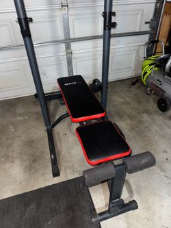 Weight bench, pull up bar power tower bench press, and rowing machine