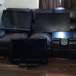 Three Flat Screen Tvs One Computer Monitor 