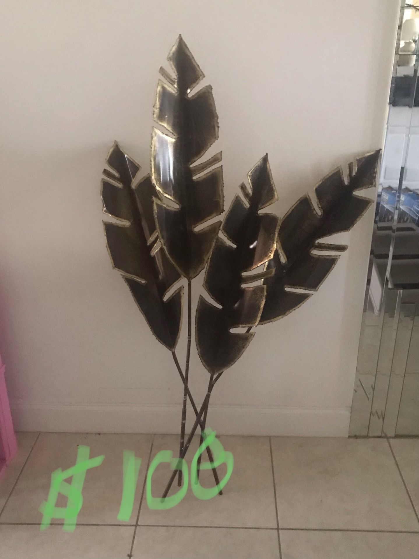 Palm leaf metal Sculpture paid $200 selling for $100 obo Negotiable