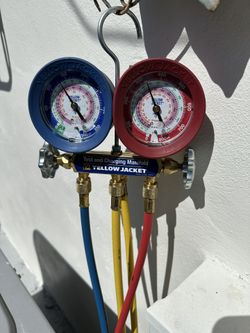 Air Conditioning/Aire Acondicionado .