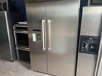 Thermidor Stainless Steel side-by-side refrigerator with stove
