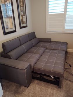 Ferriday Taupe Storage Sleeper Sectional