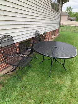 5 Piece wrought iron patio set table and chairs