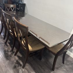 $450-USED ASHLEY’S DINNING TABLE FOR 8 DARK BROWN WOOD WITH GLASS 