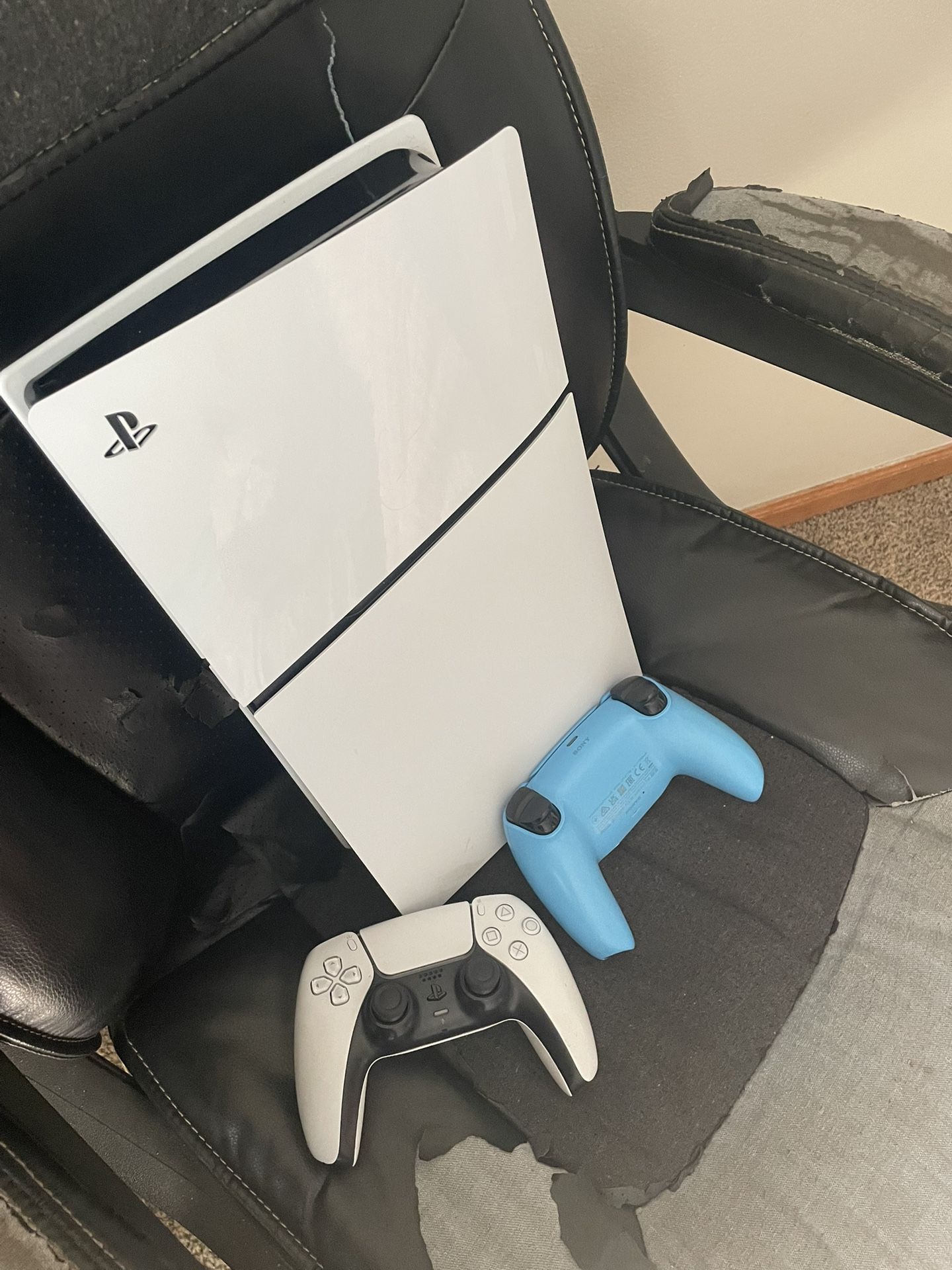 Playstation Console for sale , Comes with two controllers ( white ) and ( blue ) Great condition
