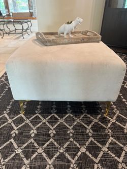 Cream and gold ottoman