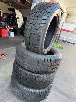 275/55/R20 marca GROUNDSPEED A/T Las 4 llantas usadas instaladas y balanceadas