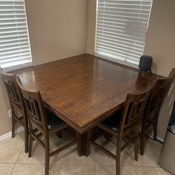 Dining table with eight chairs.