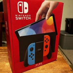 Nintendo Switch (OLED model) w/ Neon Red & Neon Blue Joy-Con 