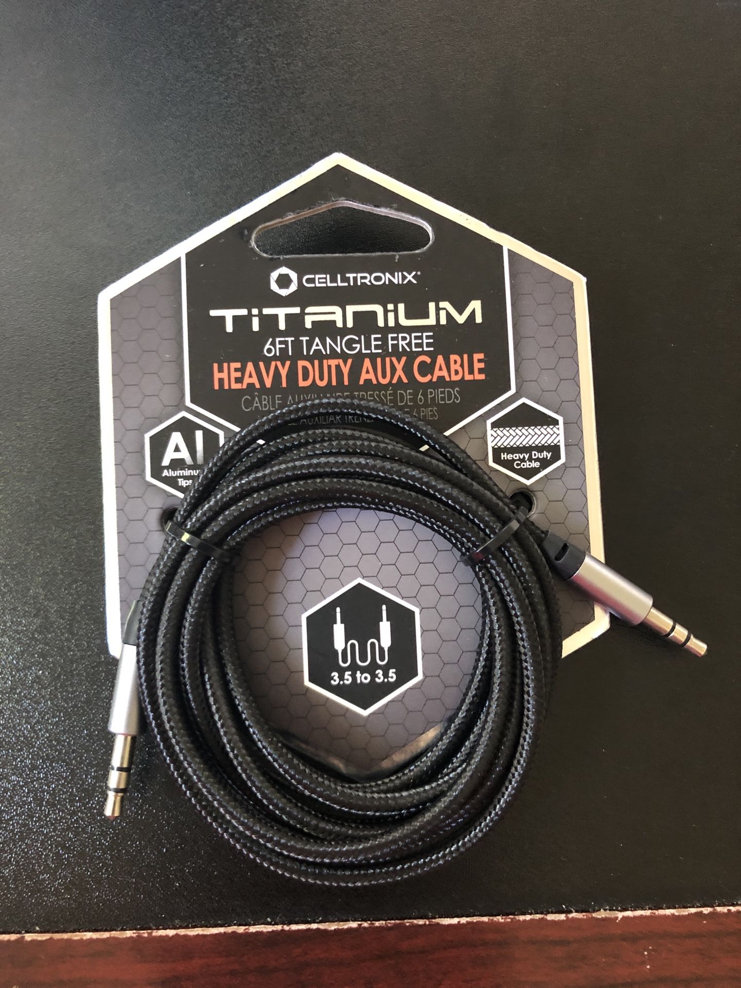 Brand new CELLTRONIX titanium 6 ft tangle free Aux cable