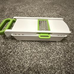 Mainstays Multi-Function Mandolin Set, a 10-piece set in white and lime green. Used only a couple of times.