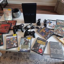 Sony PlayStation PS2 Gaming System Bundle. System DOES NOT READ DISCS !! PLEASE READ