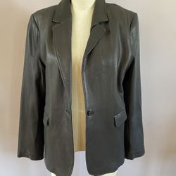 Leather jacket with ribbed sides and sleeves.