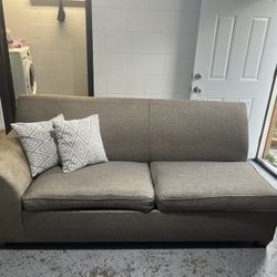 Dos sofás cama iguales 