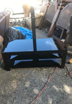 Black TV stand with glass tops