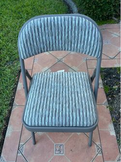Four Folding Chairs