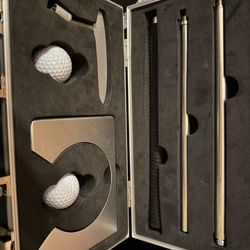 Portable putter with ball and hole 