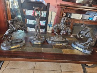 Detailed Western sculptures. Four pieces included.