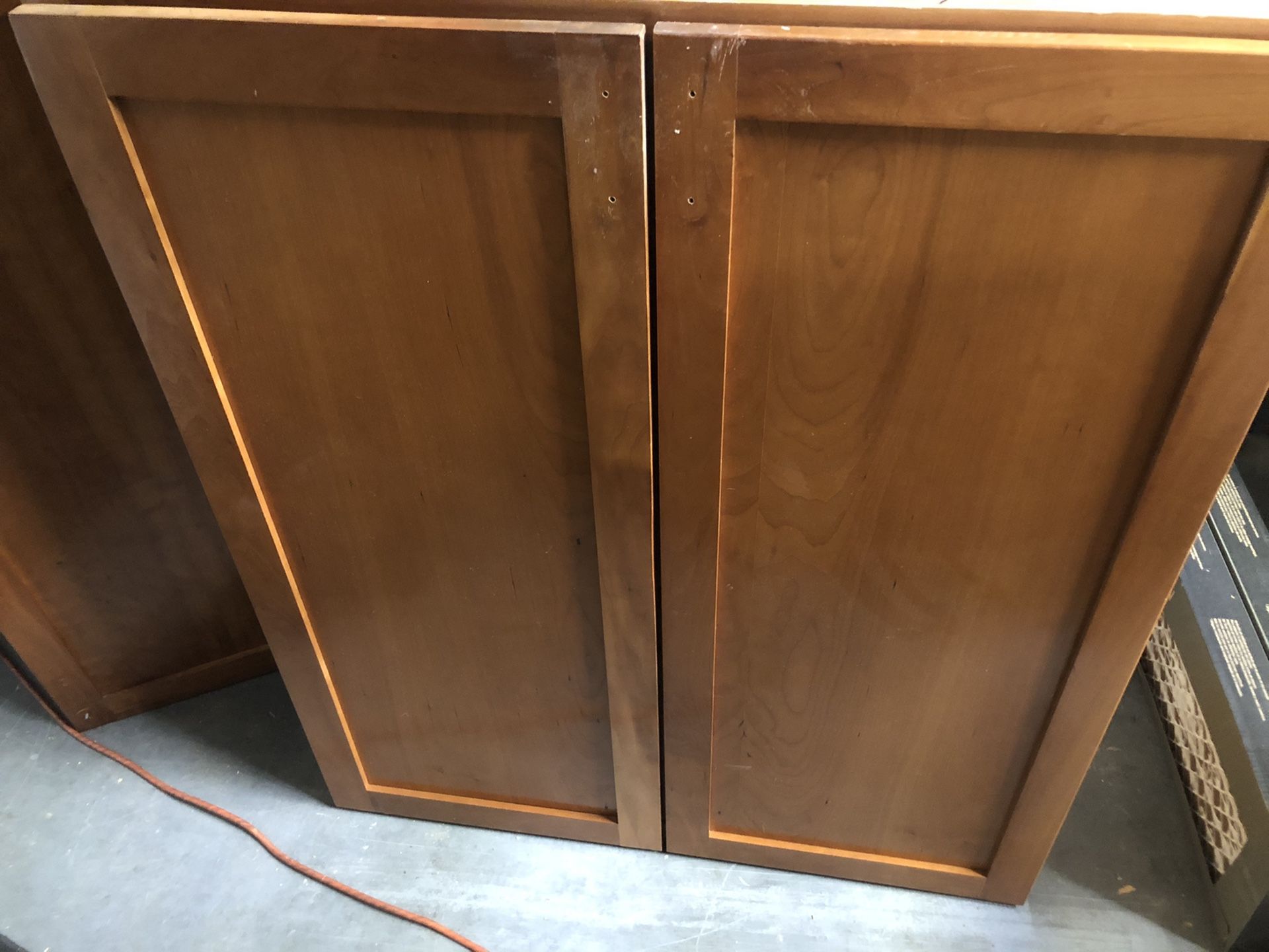 5 Upper Kitchen Cabinets in good condition.