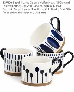 Four mugs very nice and original box