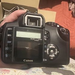 Rebel XT  Camera With Extra Batteries 