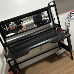 wood multi shelved desk with built in mirror 