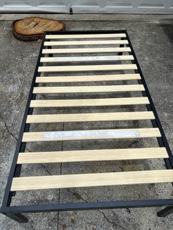 Twin bed frame with mattress