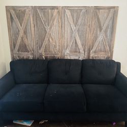 Couch And Wood Back Drop