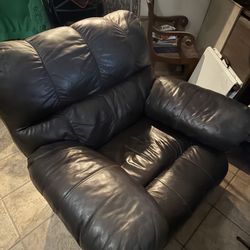 Brown leather rocker recliner