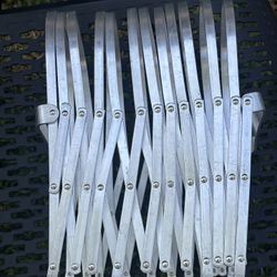 Cool, industrial mid modern look  Vintage aluminum metal accordion rack by   Evans Specialty. Great for magazines and albums Stretches out to 48 inche