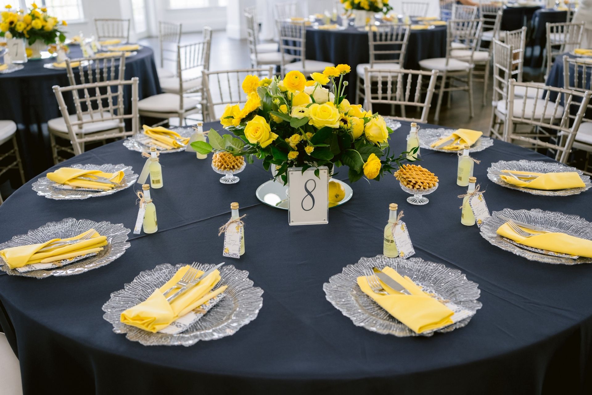 Clear Charger Plates, Navy Blue Table Cloth, Yellow Napkins 