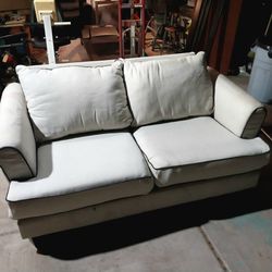 Couch sofa cream color 2 seat cushion Ashley Furniture