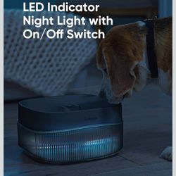 Electric  Water bowl with extra filters and a dog grooming set. 