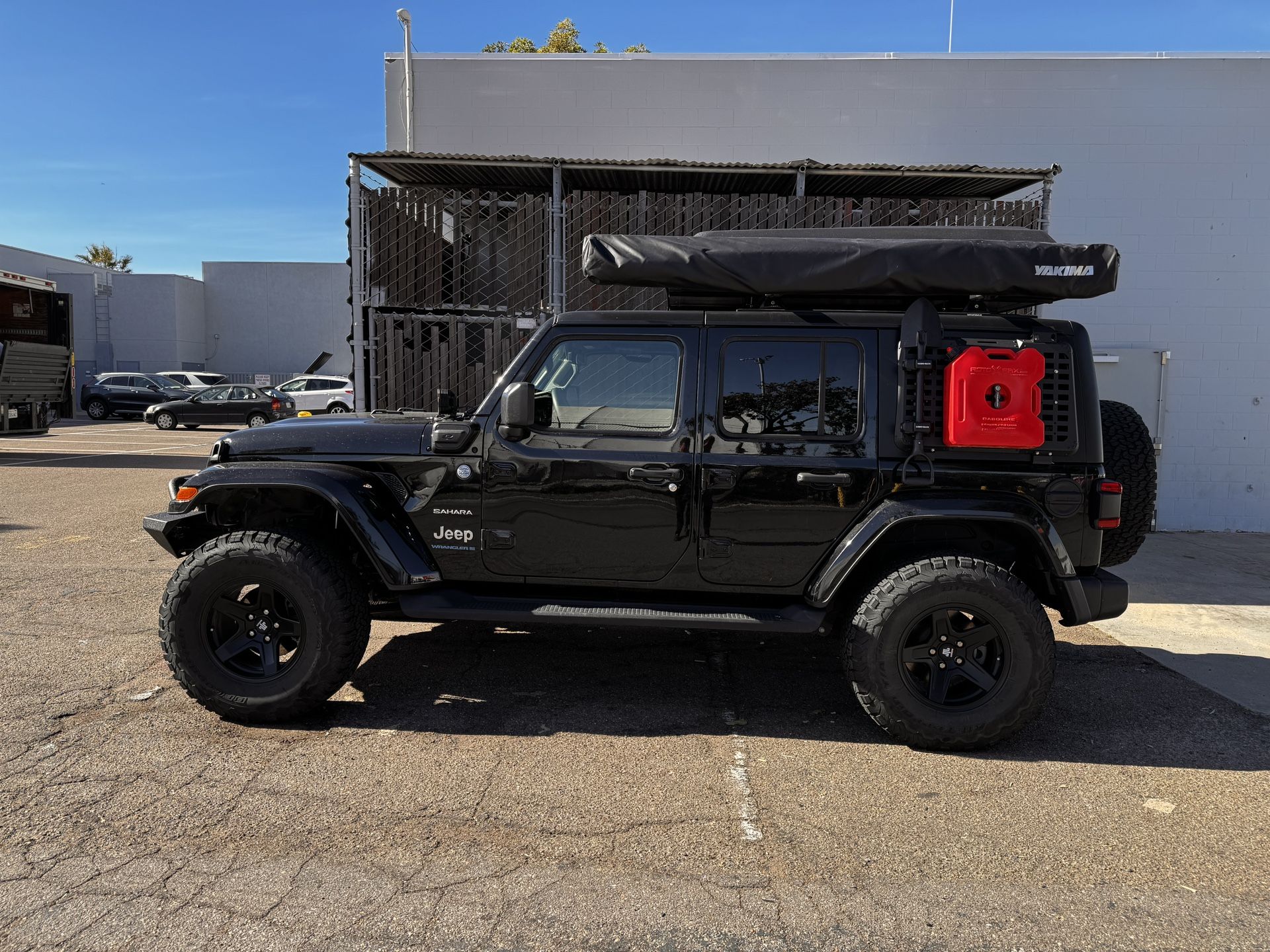 Overlanding Setup. Rooftop Tent, KC Ditch Lights, Winch and Bumper, Yakima awning. 