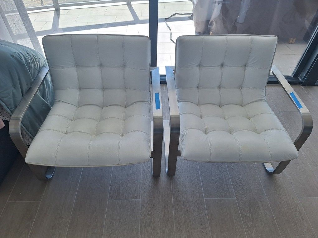 Pair of White Faux Leather Lounge Chairs