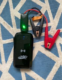 Battery Tender Portable Car jumper/ phone power bank + wireless charger