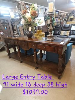 Entey Table large w3 drawers We are located at 2811 East Bell road. Another Time Around Furniture.
