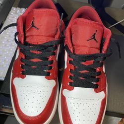 Reverse Black Toe Jordan 1 lows 