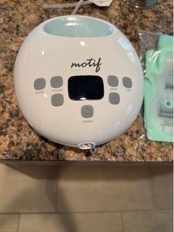 Breast Pump W/storage bags