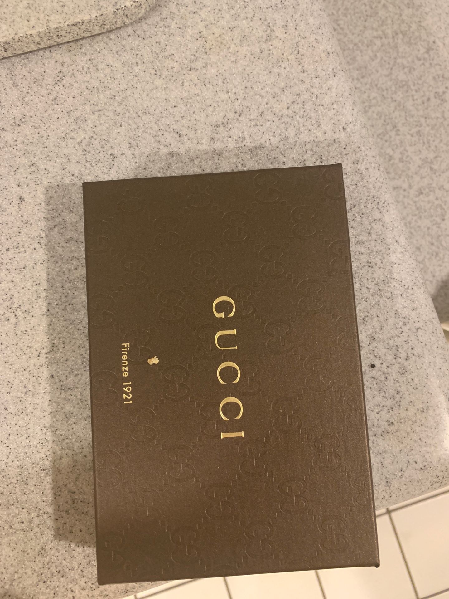 Men’s Gucci bifold wallet guccissima