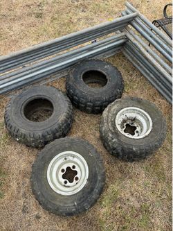22x11-9 quad rims and tires