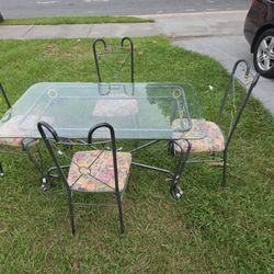 Glass Table And 4 Chairs